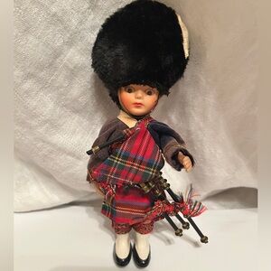 Vintage British/Scottish Kilt bagpipe doll
Soldier Sleepy Eyes Doll wearing kilt